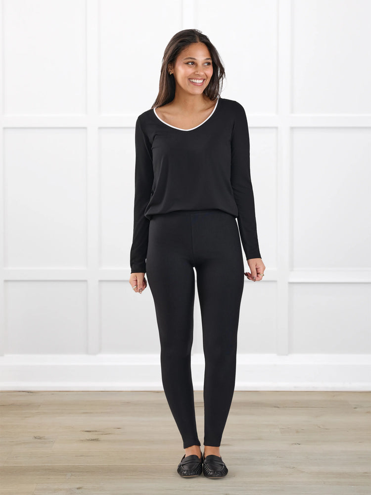Tinsley mid rise fleece legging for women in Black on model Meron, size XS @Meron-XS 