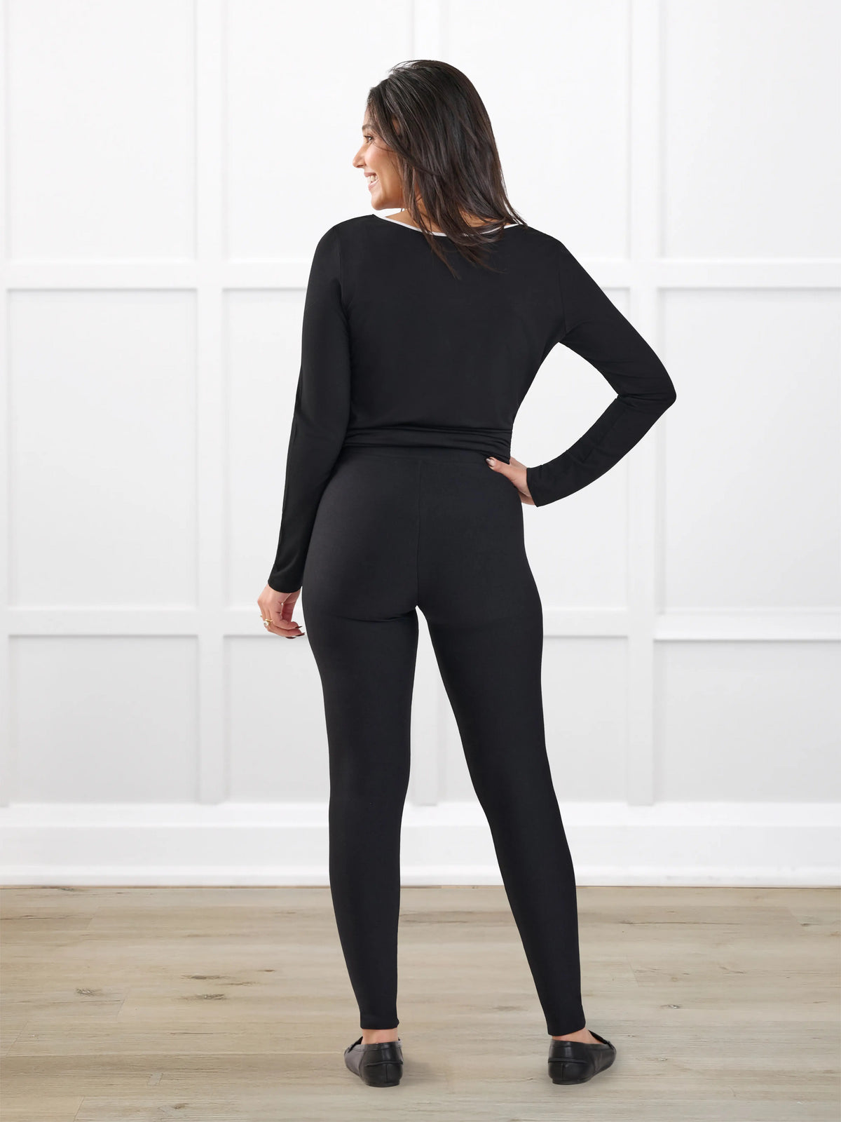 Tinsley mid rise fleece legging for women in Black on model Meron, size XS @Meron-XS 