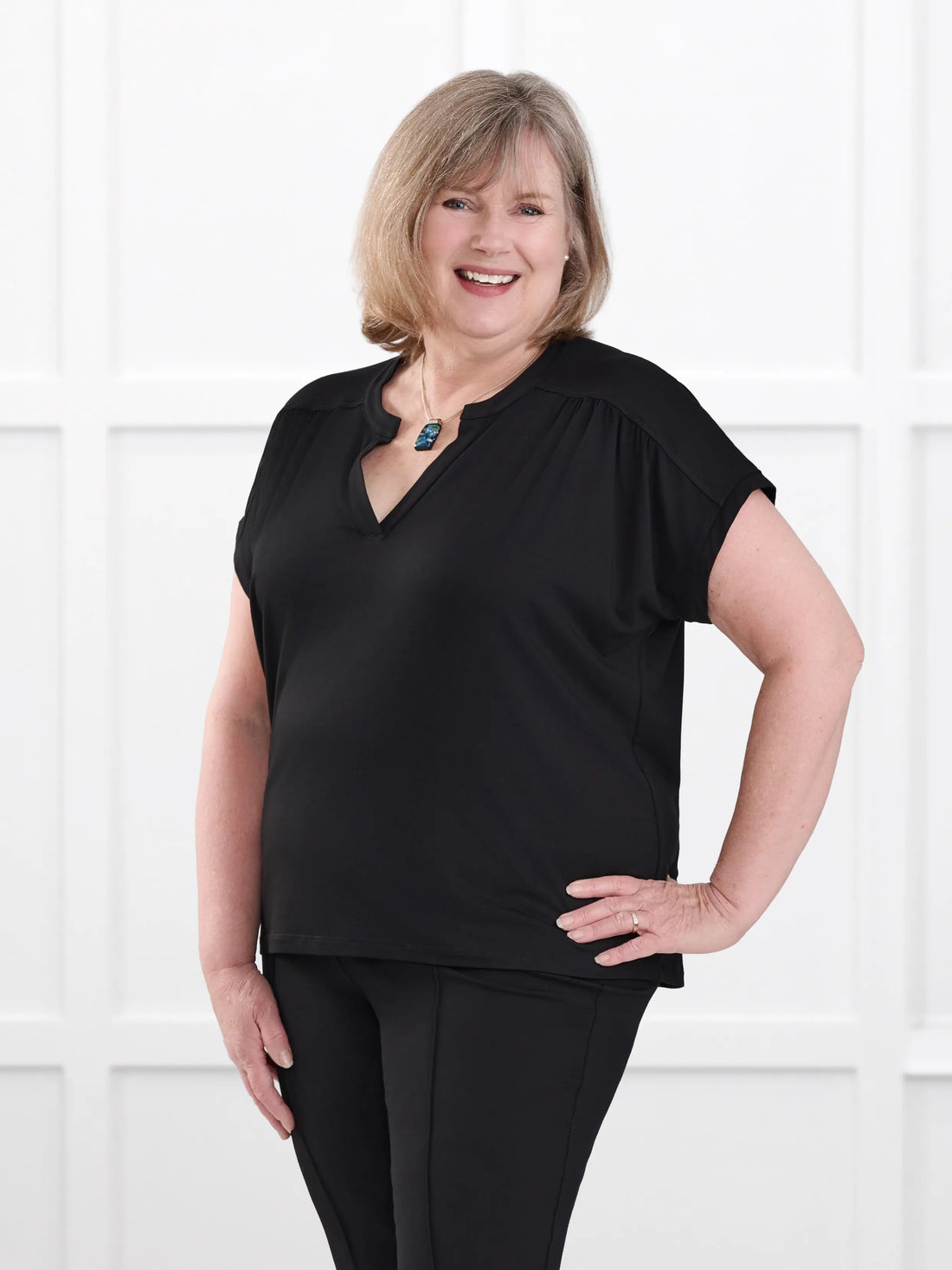 Triana ruched v neck dolman top for women in Black on model Laurie, size XL @Laurie-XL 