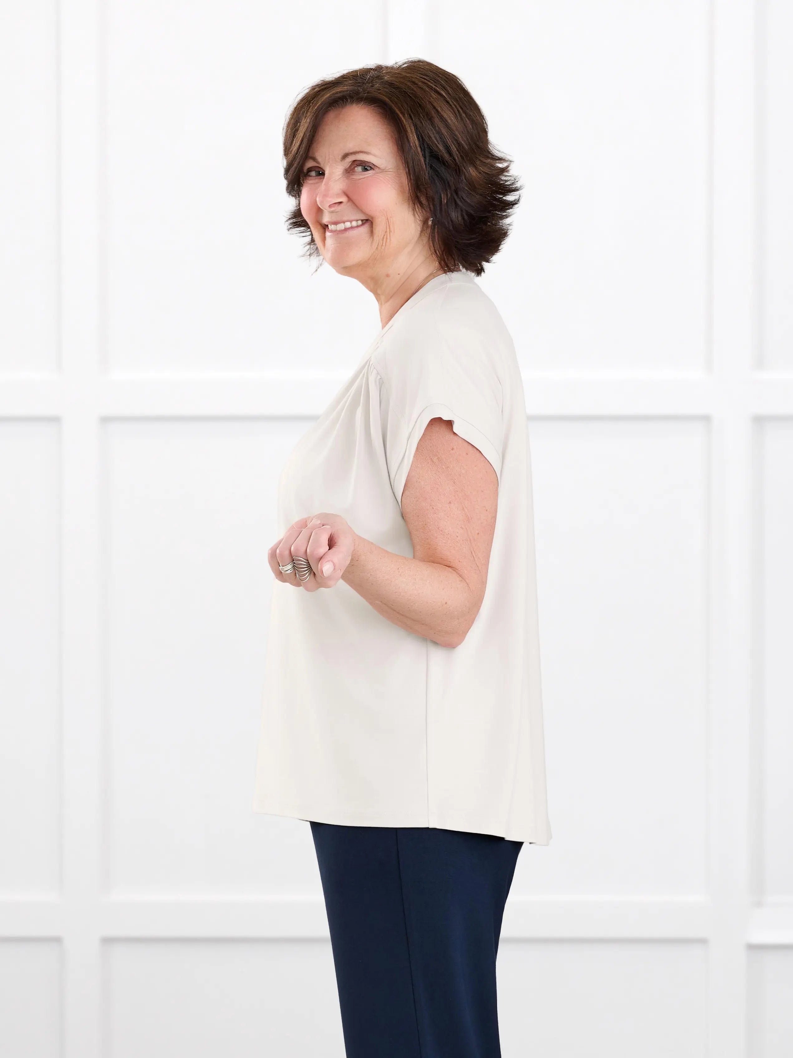 Triana ruched v neck dolman top for women in Sandstone on model Donna, size S @Donna-S 