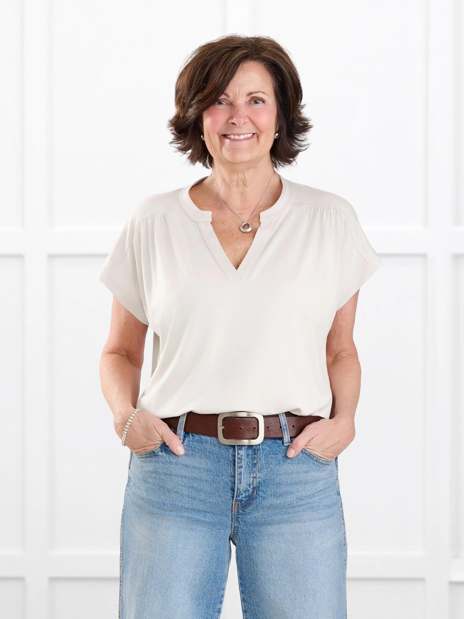 Triana ruched v neck dolman top for women in Sandstone on model Donna, size S @Donna-S 