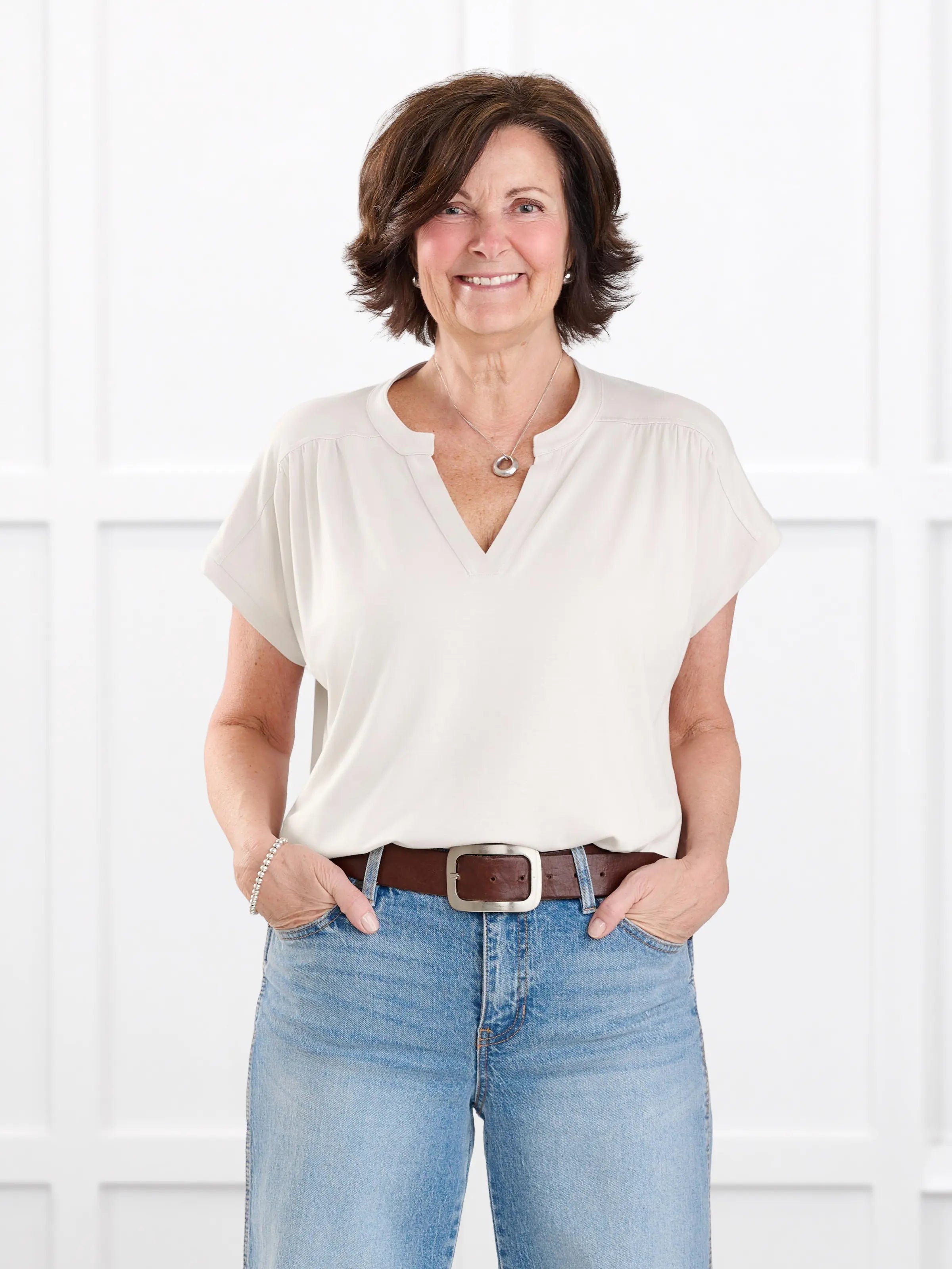 Triana ruched v neck dolman top for women in Sandstone on model Donna, size S @Donna-S 
