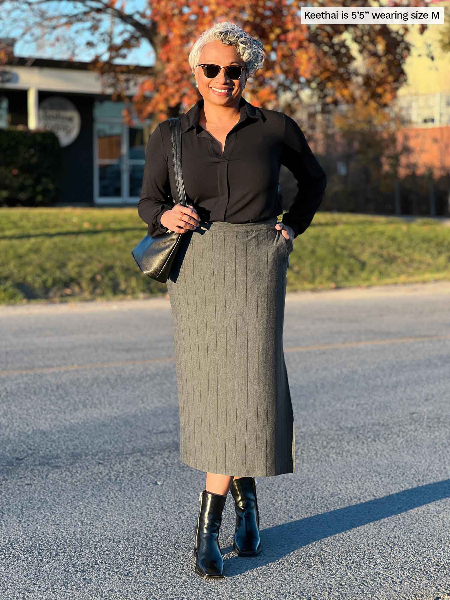 https://www.miik.ca/cdn/shop/products/Devon-midi-skirt-grey-granite-pinstripe-for-women-3_1268727c-eb11-4320-a448-79f0cbbb464d_1500x.jpg?v=1704748728