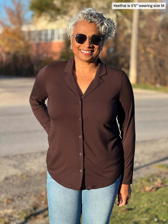 Women smiling wearing Miik's Keeley notched collar long sleeve blouse in dark chocolate, jeans and sunglasses
