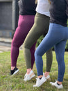 A close up image of the back/side of the three colours of the Miik's Lisa2 colourful high waisted legging: port melange, sage melange and navy melange 