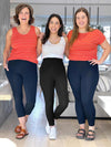 Group image of women wearing Miik's Seana high waisted pocket capri legging in navy and black with t-shirts.