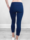 A close up of the back of Miik's Seana high waisted pocket capri legging in navy