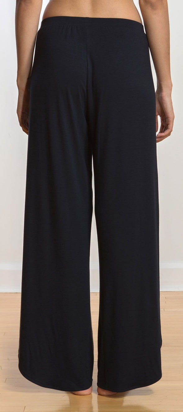 A close-up image of the back of Miik's Shea tulip pant in black.
